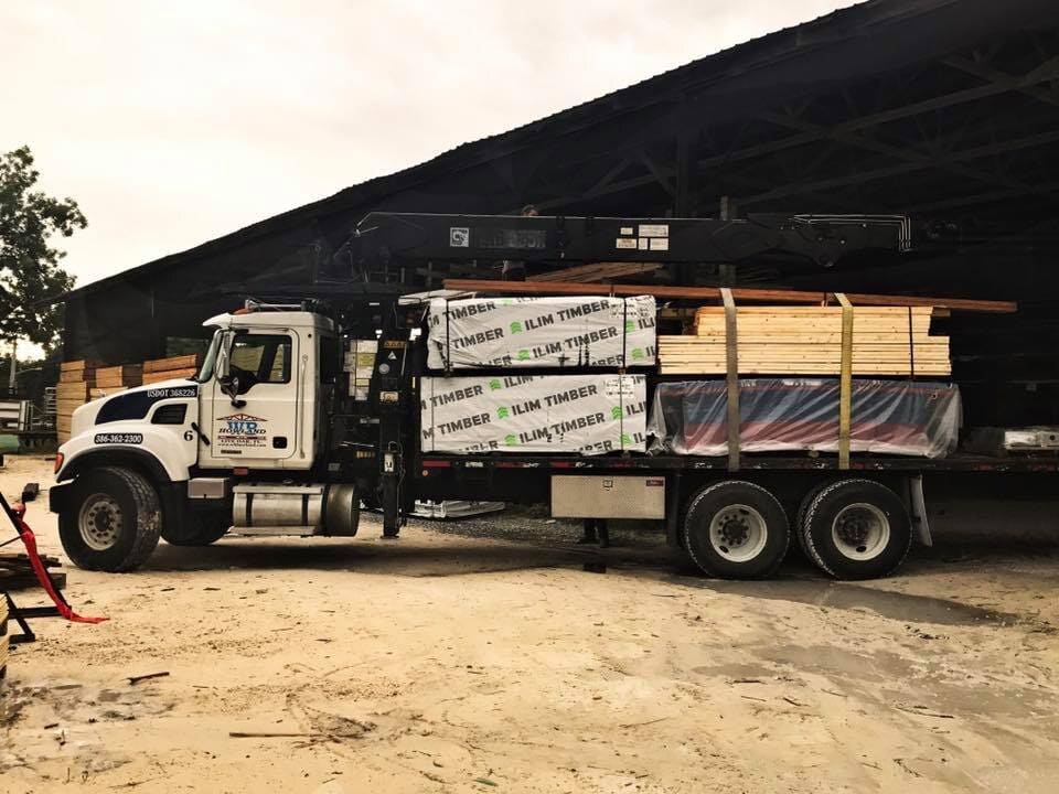 WB Howland building-supply yard with lumber and materials